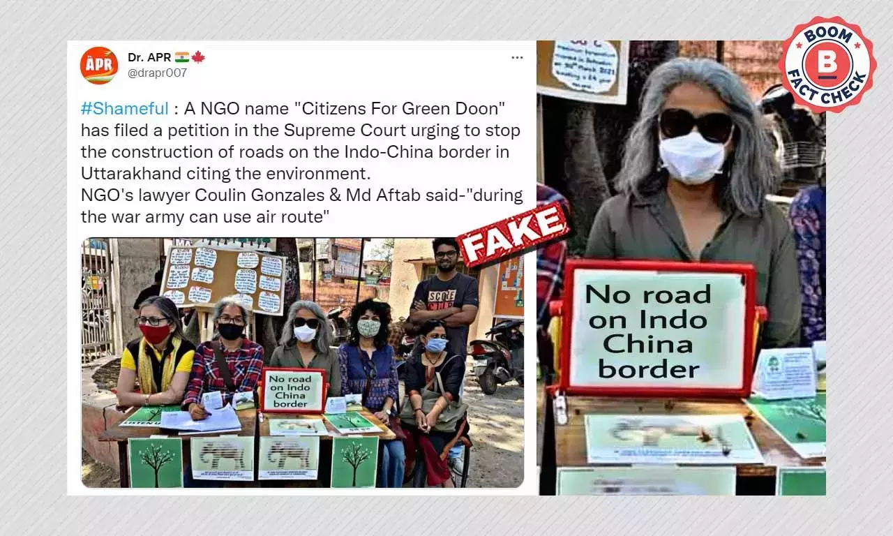 ভারত-চিন সীমান্তে রাস্তা তৈরির বিরোধিতায় প্ল্যাকার্ড? ছবিটি সম্পাদিত ভারত-চিন সীমান্তে রাস্তা তৈরির বিরোধিতায় প্ল্যাকার্ড? ছবিটি সম্পাদিত